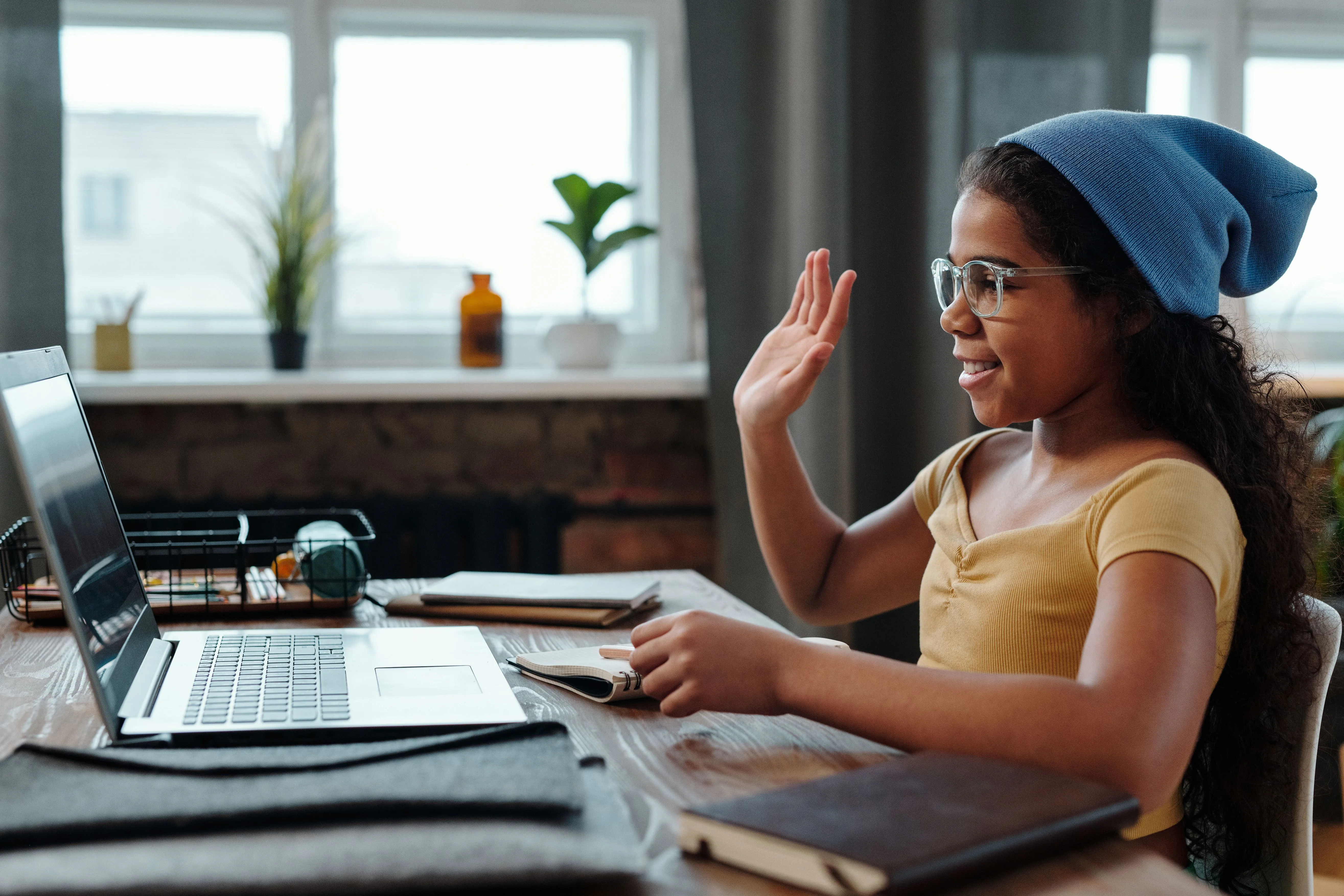 student-attending-online-class-from-home